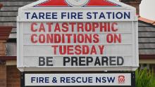 A sign on a Taree fire station warns of "catastrophic" fire conditions.