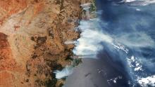 This satellite image shows wildfire smoke on November 14.