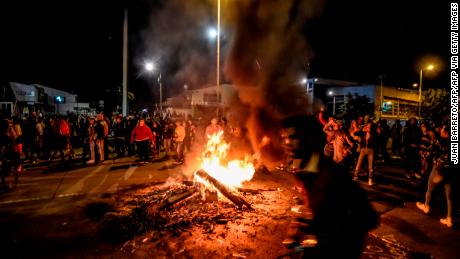 Authorities impose curfew in Bogota after protests turn violent