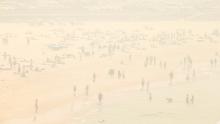 A smoke haze blankets Bondi Beach as the air quality index reaches higher than ten times hazardous levels in some suburbs of Sydney on December 10.