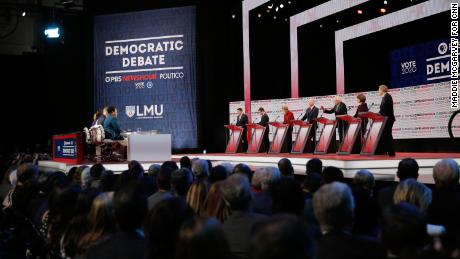 Presidential candidates Andrew Yang, Pete Buttigieg, Elizabeth Warren, Joe Biden, Bernie Sanders, Amy Klobuchar and Tom Steyer participate in the Democratic debate co-hosted by Politico and PBS Newshour in Los Angeles, California, on Thursday, December 19.