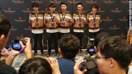 Dota 2 players of team RNG posing for a group photo during the International Dota 2 Championships in Shanghai on August 19.