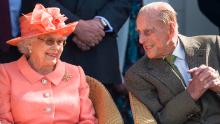 Queen Elizabeth and Prince Philip attend a polo match in Egham, England, in June 2018.