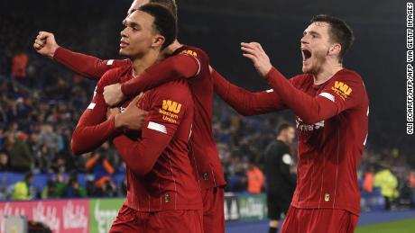 Trent Alexander-Arnold (far left) had two assists and rounded off the scoring in the rout of Leicester City. 