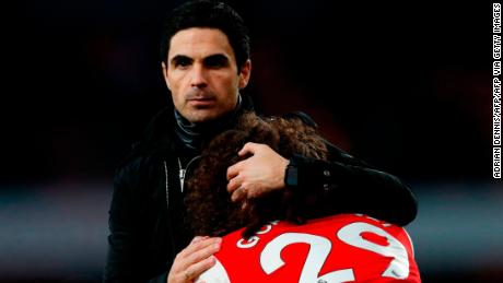 Arsenal manager Mikel Arteta hugs Matteo Guendouzi after Arsenal lost 2-1 to Chelsea. 