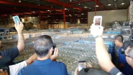 Official fired after storm supplies found in warehouse