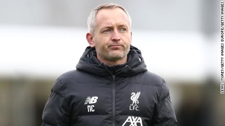Neil Critchley looks on during the Premier League International Cup match between Liverpool U23 and Paris Saint-Germain U23.