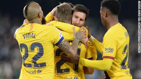 Frenkie De Jong celebrates his goal with Lionel Messi.