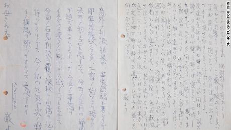 A letter that Iwao Hakamada wrote to his mother from prison, claiming his innocence, sits on tatami mat in Hamamatsu.