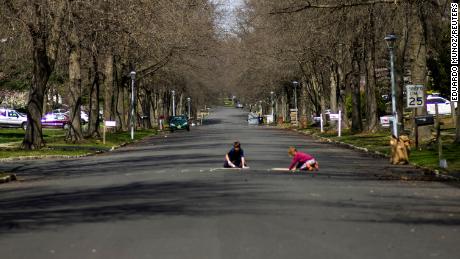 Children play on a residential street in Matawan, New Jersey on April 1, 2020.