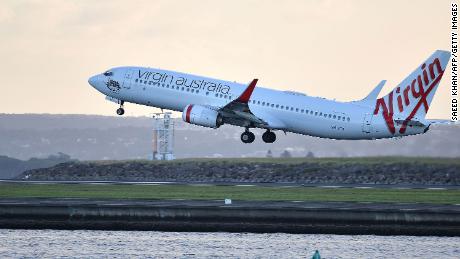 A Virgin Australia flight taking off from Sydney International Airport in March.