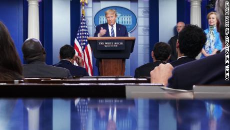 An aggrieved Trump blames press for furor over disinfectant comments