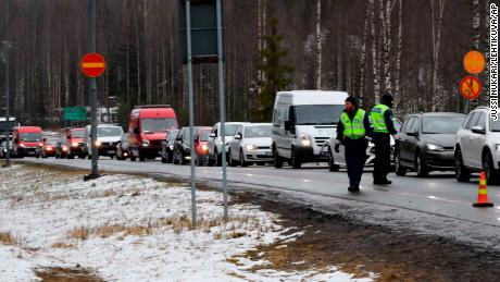 Cars at a traffic control post in Hyvinkaa, Finland, on April 15, during the lockdown of Uusimaa, the nation&#39;s most populous region.