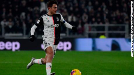 Dybala controls the ball during the Coppa Italia match against Udinese.