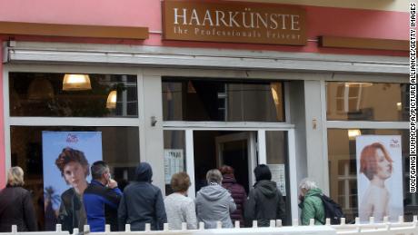 A line forms at a salon in Berlin on Monday after hairdressers were allowed to reopen.
