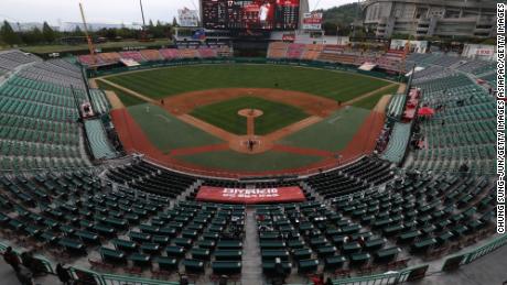 The SK Wyverns and the Hanwha Eagles play in an empty SK Happy Dream Ballpark on Tuesday, which was opening day for the Korean Baseball League.