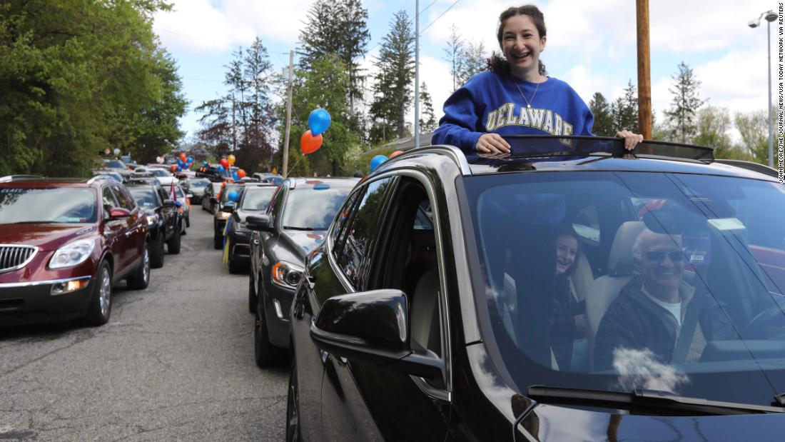 A Briarcliff High School student participates in a parade of graduating seniors through Briarcliff Manor, 纽约, 在5月 9.