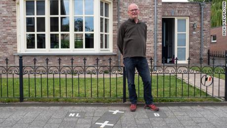 Though most of Julien Leemans' house is in the Netherlands, his front door is in Belgium.