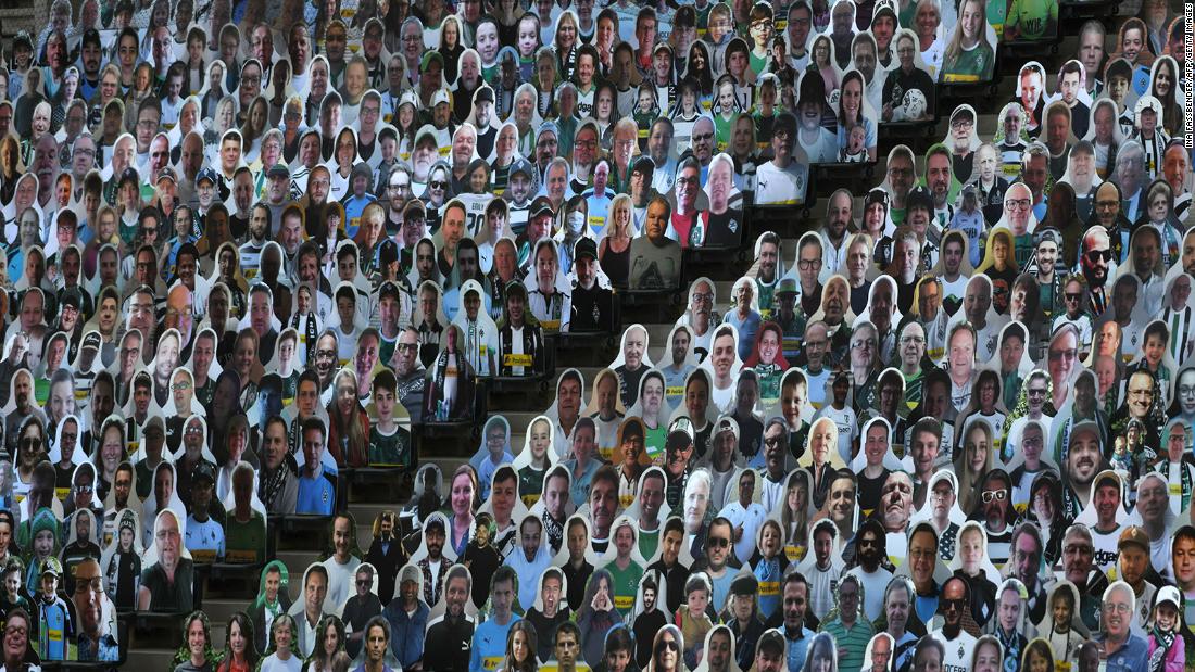 Cardboard cutouts of soccer fans are seen at the Borussia-Park stadium in Mönchengladbach, Germany, 在5月 19. The Bundesliga,德国y&#39;s top pro soccer league, became &lt;a href =&quot;https://www.cnn.com/2020/05/16/sport/germany-bundesliga-return-football-spt-intl/index.html&quot; 目标=&quot;_空白&amp报价t;&gt;the first major European competition to return amid the coronavirus pandemic.&ltp;lt;/一个gtmp;gt;