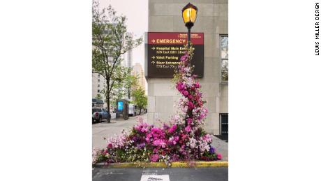 This flower flash, set up outside the New York-Presbyterian Hospital, was dedicated to the health care workers on the front lines of the pandemic. 