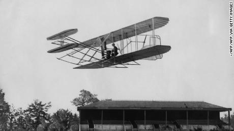 Picture taken on August 8, 1908 of the first public flight of US Wilbur Wright on his 1908 Flyer IIIA airplane at the Hunaudières horse racing track near the town of Le Mans, France. (Photo by - / AFP)        (Photo credit should read -/AFP via Getty Images)