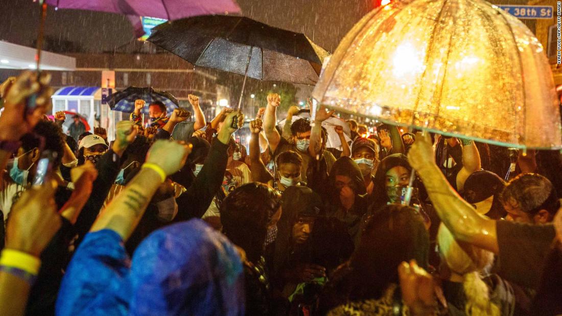 Minneapolis protesters gather in the rain on May 26.