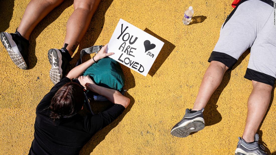 Protesters lie in a street near the White House on June 7.