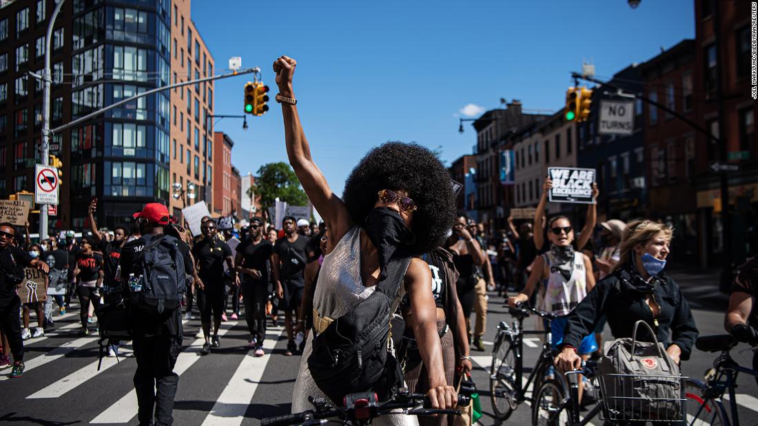 Demonstrators in New York make their way through Brooklyn on June 13.