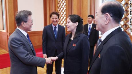 South Korean President Moon Jae-in, left, shakes hands with Kim Yo Jong, North Korea leader Kim Jong Un&#39;s sister.