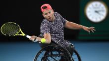 Dylan Alcott hits a return during the men&#39;s wheelchair singles final at the Australian Open.