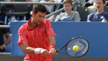 Serbia&#39;s Novak Djokovic returns the ball during an exhibition tournament in Zadar, Croatia, Sunday, June 21, 2020.