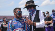 NASCAR Hall of Famer Richard &quot;The King&quot; Petty, right, talks with Bubba Wallace before the NASCAR Cup Series GEICO 500 at Talladega Superspeedway on Monday.