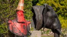 A statue in the grounds of Belgium&#39;s Royal Museum for Central Africa, featuring a bust of KIng Leopold II, has been covered in red paint and topped with a traffic cone &quot;dunce&#39;s cap.&quot;