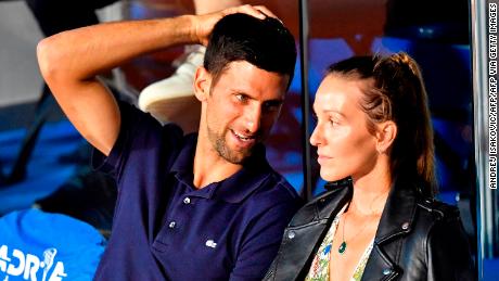 Serbian tennis player Novak Djokovic (L) talks to his wife Jelena during a match at the Adria Tour, Novak Djokovic's Balkans charity tennis tournament in Belgrade on June 14, 2020.