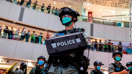 A riot police officer stands guard during a clearance operation during a demonstration in a mall in Hong Kong on July 6, 2020, in response to a new national security law introduced in the city.