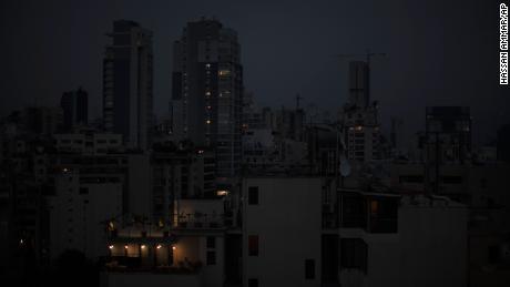 The capital city of Beirut remains in darkness during a power outage on Monday, July 6, 2020.
