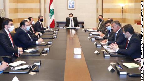 Lebanese Prime Minister Hassan Diab and Iraq&#39;s Oil Minister Ihsan Abdel-Jabbara hold a meeting in Beirut on July 3, 2020. 