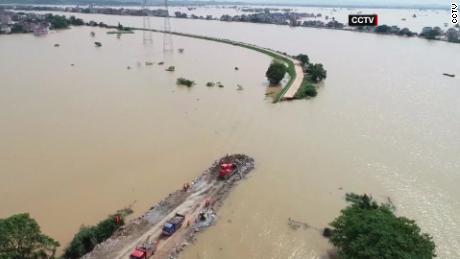 Parts of China wrecked by raging flood waters