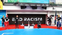 Lewis Hamilton takes a knee in support of the Black Lives Matter movement.