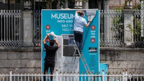 Workmen dismantle the Hagia Sophia Museum ticket booth on July 17, 2020 in Istanbul.