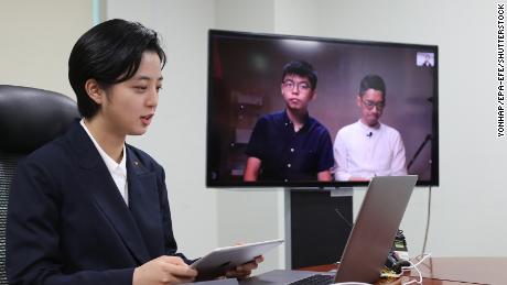 Ryu Ho-jeong, a lawmaker of South Korea&#39;s minor opposition Justice Party, holds a videoconference with Hong Kong pro-democracy advocates Nathan Law and Joshua Wong from the National Assembly in Seoul, South Korea, 10 June 2020.
