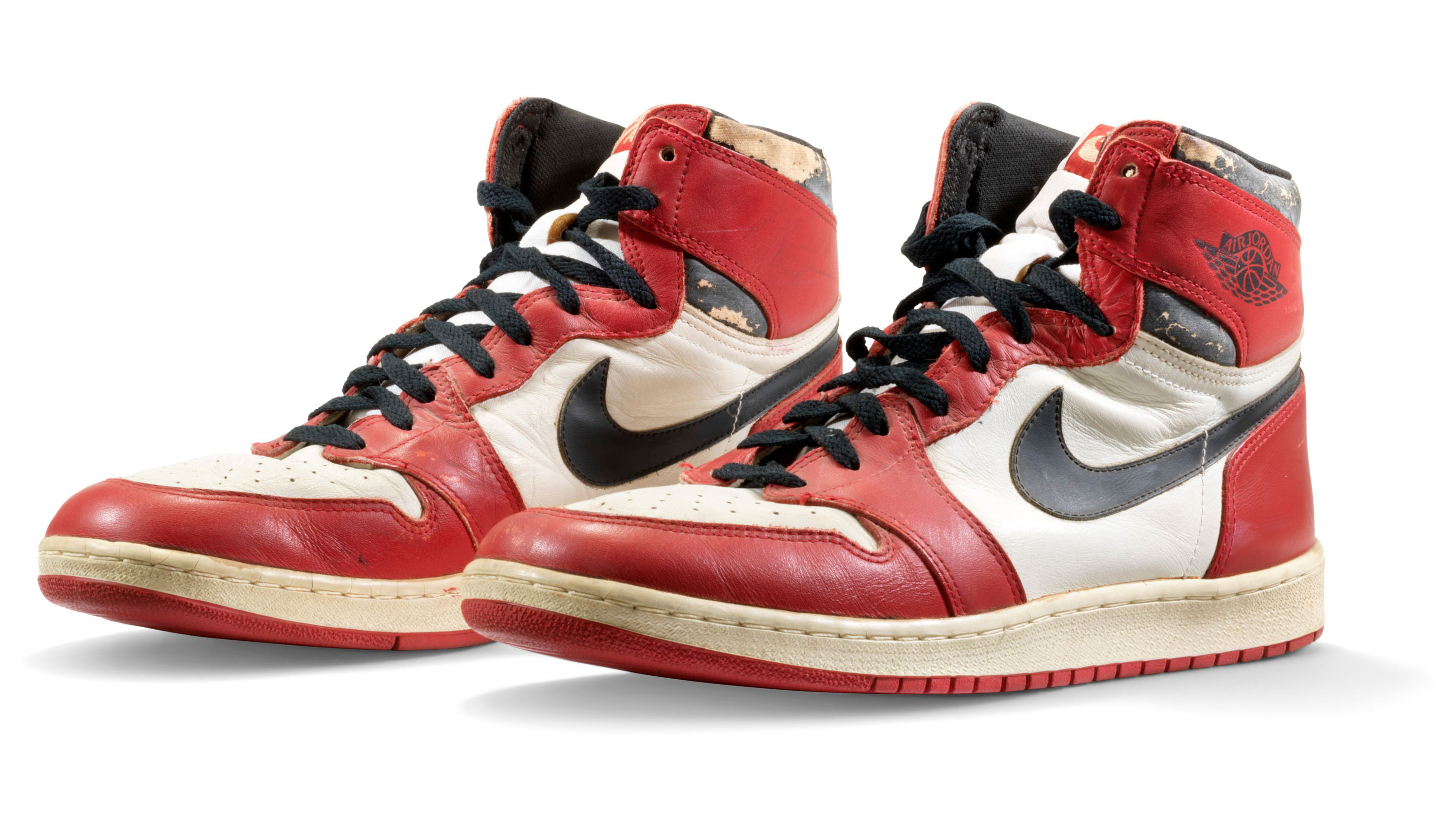 Michael Jordan's game-worn sneakers sell for a record $615,000 ...