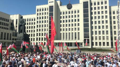 Pro-government supporters gather in Minsk on August 16, 2020 ahead of the arrival of President Alexander Lukashenko at a rally. 