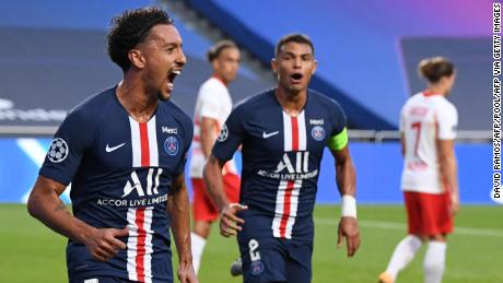 Paris Saint-Germain defender Marquinhos celebrates after opening the scoring goal for the French club.