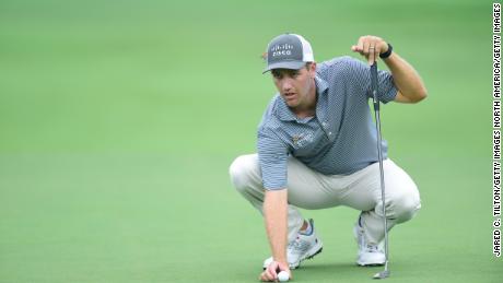 Todd lines up a putt on the tenth green during the first round of the Wyndham Championship.