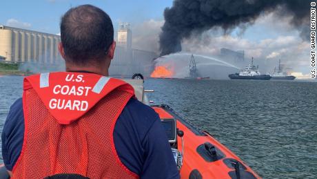 Coast Guard crews respond to a dredge on fire in the Port of Corpus Christi Ship Channel.