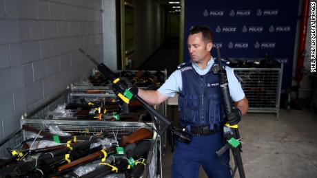 Police Sergeant Jeremy Steedman handles some of the firearms that have been removed from circulation as part of the firearms buyback at the Papakura Police Station on December 21, 2019, in Auckland, New Zealand. 