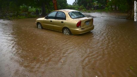 Tropical Storm Laura caused flooding Saturday in Salinas, Puerto Rico.