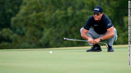 Mickelson lines up a putt on the 13th green during round one of the Charles Schwab Series.
