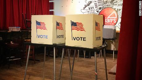 Photos of a polling location at Ian&#39;s Pizza in Madison, Wisconsin during Wisconsin&#39;s August primary voting.